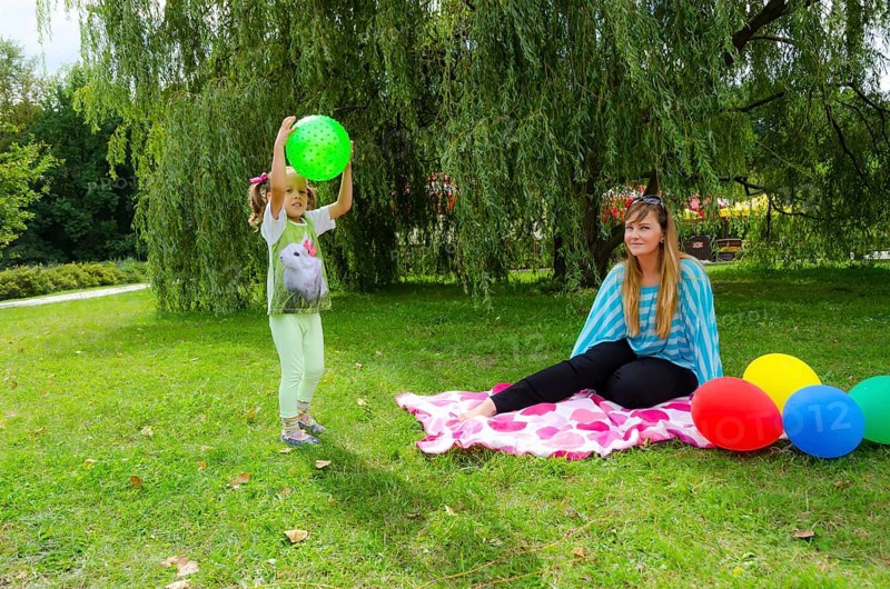 Small girls with aerial balloon