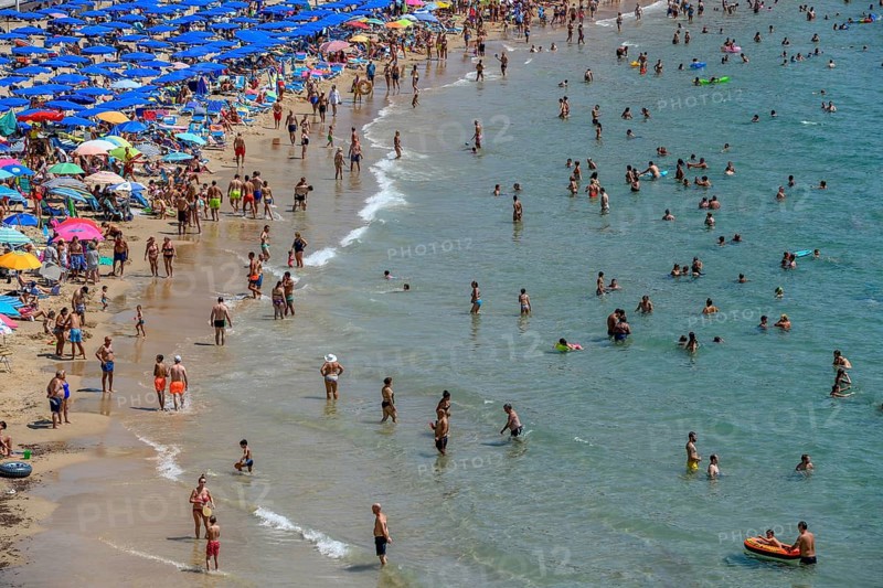 Many tourists at Playa Levante, Benidorm, Alicante province, Costa Blanca, Spain, Europe