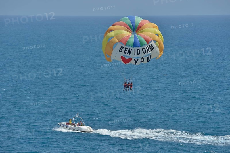 Excursion boat with paraglider, labeled "Benidorm loves you", Playa Levante, Benidorm, Costa Blanca, Spain, Europe