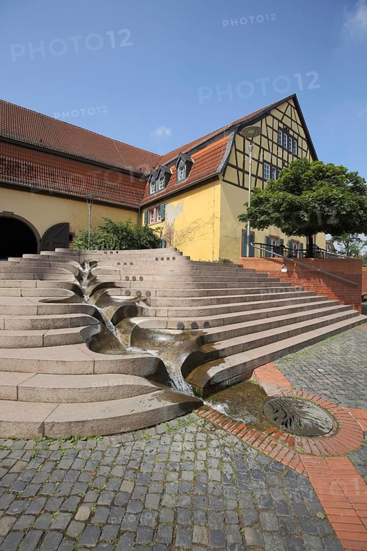 Market square and fountain with water features and half-timbered house Alter Posthof, Hattersheim, Taunus, Hesse, Germany, Europe