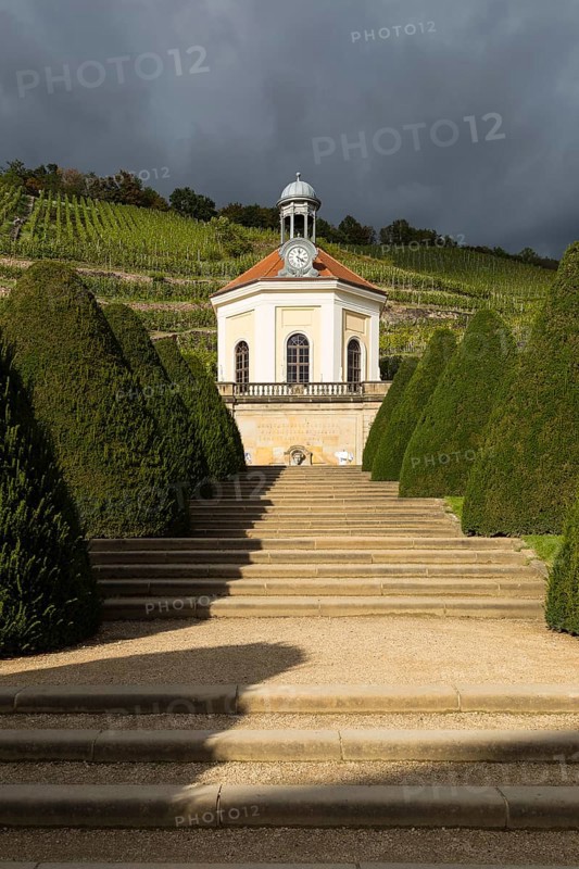 Belvedere in Wackerbarth Castle Park with vineyards in sunshine and rain cloud, Radebeul, Saxony, Germany, Europe