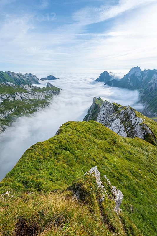 View of mountain peaks above the sea of clouds, Säntis mountains and valley of Meglisalp, high fog, Appenzell Ausserrhoden, Appenzell Alps, Switzerland, Europe