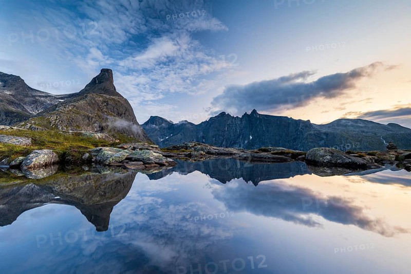 Romsdalshornet mountain reflected in mountain lake, Åndalsnes, Møre og Romsdal, Norway, Europe
