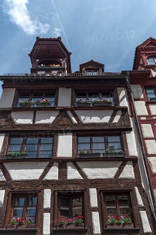 Historic half-timbered house with roof lift bay, Untere Krämergasse 18, Nuremberg, Middle Franconia, Bayernm, Germany, Europe