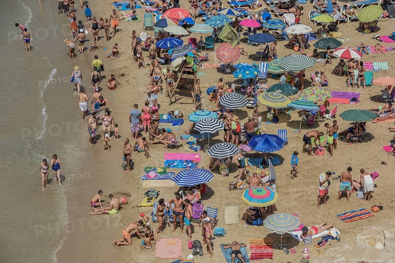 Tourists at the Playa Mal Pas, Benidorm, Province of Alicante, Costa Blanca, Spain, Europe