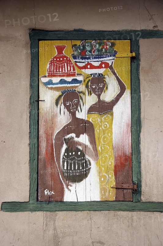 Painted and decorated window shutters of house, Klouto, Togo, West Africa, Africa