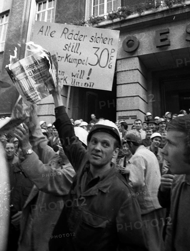 With a siege and temporary occupation of the Hoesch AG headquarters on 11.9.1969, spontaneous striking steelworkers opened a series of strikes in the coalfields.Strikers symbolically burn the Bild newspaper because of false and discriminatory reports, Germany, Europe