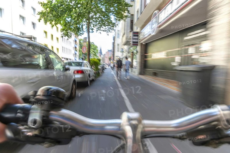 Cycling from a first-person perspective on a cycle path in Cologne, North Rhine-Westphalia, Germany, Europe