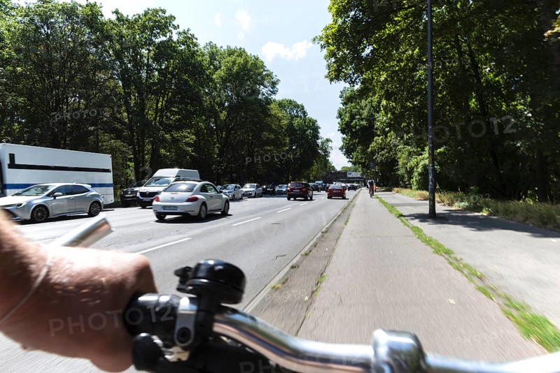 Cycling from a first-person perspective on a cycle path in Cologne, North Rhine-Westphalia, Germany, Europe