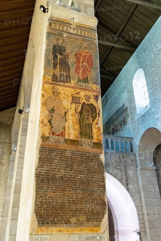 Ebreuil village, wall painting of Saint-Leger benedictine abbey, abbey church from the 10th century, Allier department, Auvergne-Rhone-Alpes, France, Europe