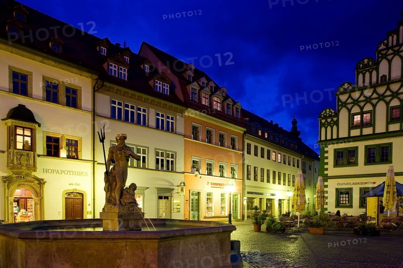 The square was given its distinctive shape in the 16th century by the town house and the semi-detached house to the east, the left half of which is now known as the Cranach House, the Court Pharmacy to the north and the inn Zum Schwarzen Bären to the south.In the centre of the market, the Neptune Fountain