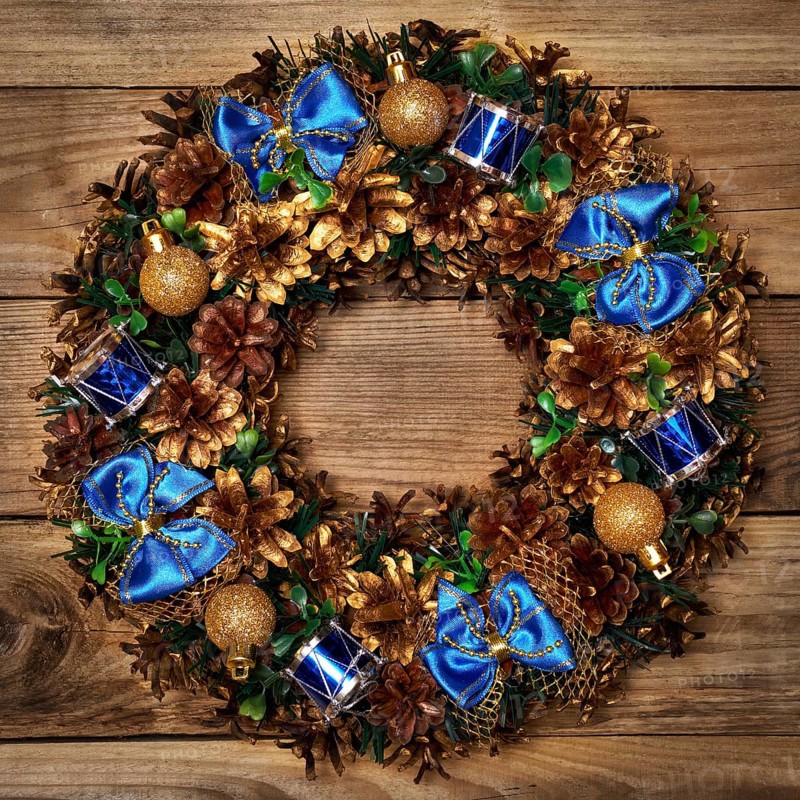Christmas wreath on wooden background
