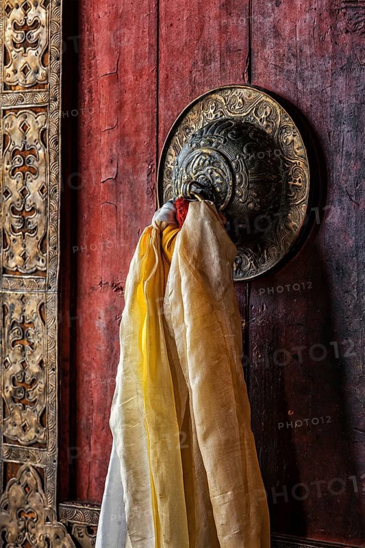 Decorated door handle of gates of Thiksey gompa (Tibetan Buddhist monastery) . Ladakh, India, Asia