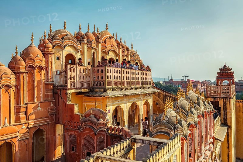 JAIPUR, INDIA, NOVEMBER 18, 2012: Tourist visiting Hawa Mahal palace (Palace of the Winds) famous Rajasthan tourism landmark
