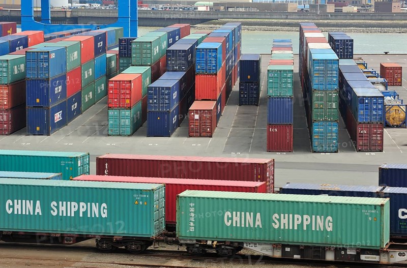 Stacked containers in the container terminal in the port of Zeebrugge, Belgium, Europe