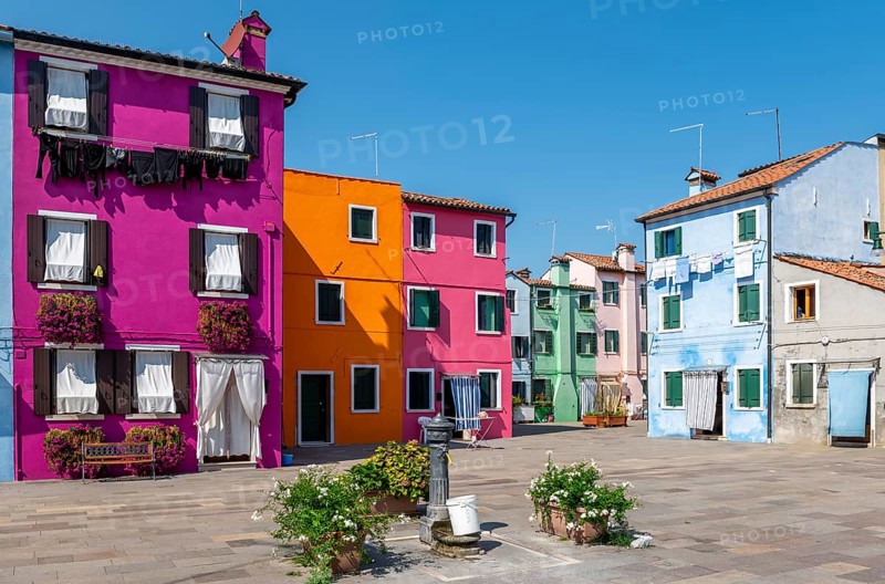Colourful houses with washing lines and flowers, colourful house facades, alleyways on the island of Burano, Venice, Veneto, Italy, Europe