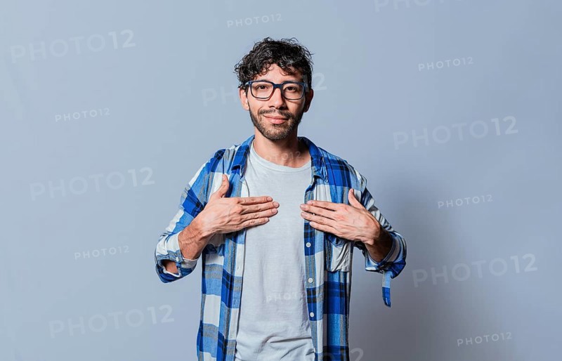 Smiling person gesturing the word HAPPINESS in sign language, Interpreter man gesturing the HAPPINESS in sign language. Young man gesturing THANKFUL in sign language