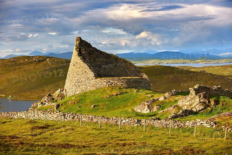 Pictures of Dun Carloway Broch on the Isle of Lewis in the Outer Hebrides, Scotland. Brochs are among Scotland's most impressive prehistoric buildings and were the precursors of the Medieval Scottish Tower Houses. The world Broch is derived from lowlan