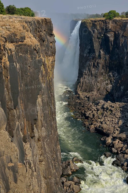 Rainbow over Victoria Falls, Matabeleland North Province, Zimbabwe, Africa