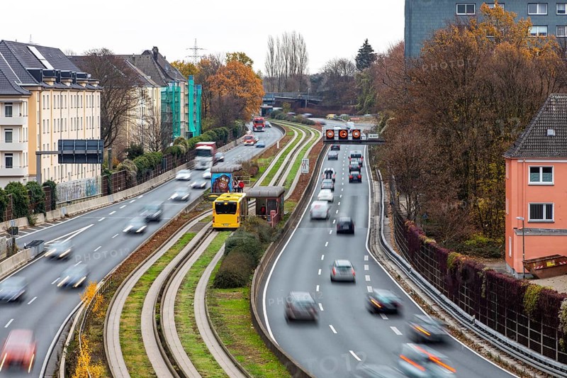 Motorway A40, Ruhrschnellweg, skyline of the city centre of Essen, exit Essen-Huttrop, track bus route, this area would also be affected by a diesel driving ban, Essen, North Rhine-Westphalia, Germany, Europe