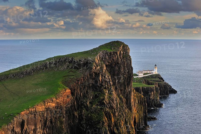 Neist Point Lighthouse at sunset on the Isle of Skye, Inner Hebrides, Scotland, UK