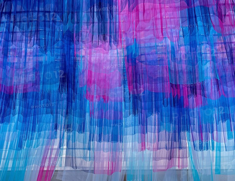 Colourful silk curtains at the CaixaForum, cultural centre in the former Fabrica Casaramona, Barcelona, Spain, Europe