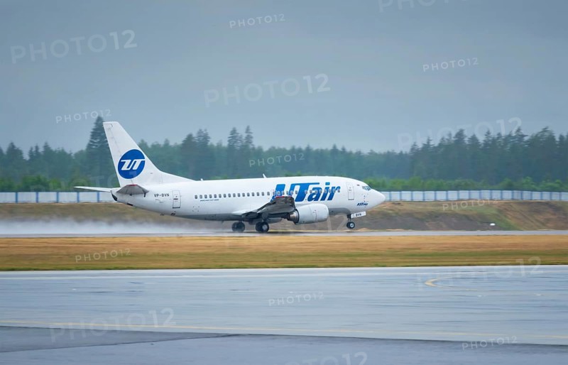 MINSK, BELARUS, JUNE 15, 2018: UTAir flight Boeing 737-500 plane taxi on runway in National Airport Minsk