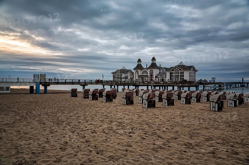 Empty beach chairs in front of the pier Sellin at dusk, long exposure, Baltic resort Sellin, Insel Rügen, Mecklenburg-Vorpommern, Germany, Europe