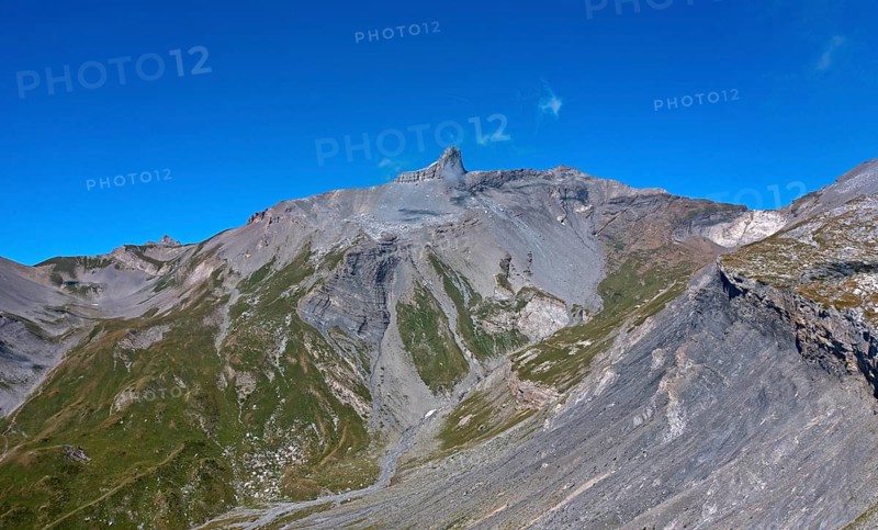 The rock tooth Tita Seri stretches into the blue sky, Bernese Alps, Ovronnaz, Valais, Switzerland, Europe