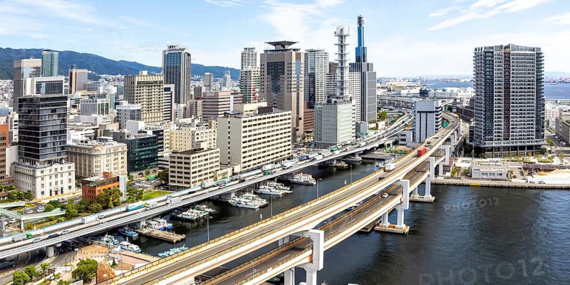 Kobe skyline from above with harbour and elevated road panorama in Kobe, Japan, Asia