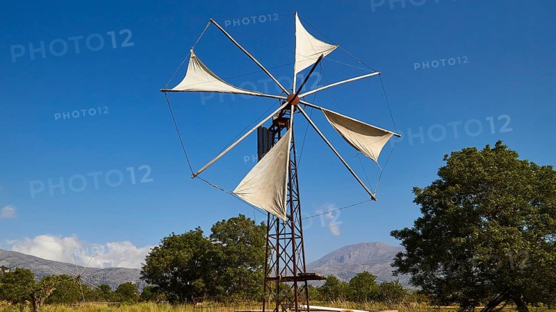 Windmill close, canvas, trees, blue sky, few white clouds, Lassithi plateau, Lassithi, East Crete, island of Crete, Greece, Europe