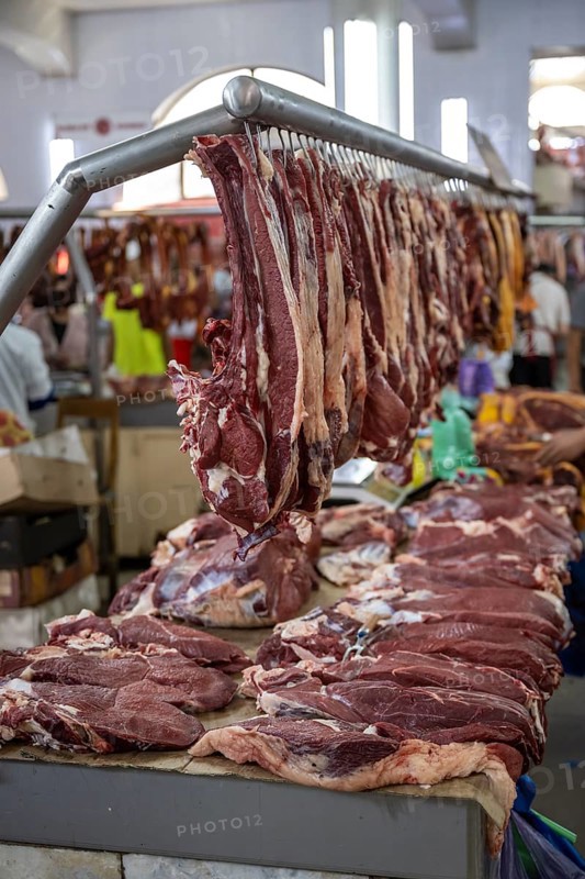 Butcher's shop, fresh meat, market at Osh Bazaar, Bishkek, Kyrgyzstan, Asia