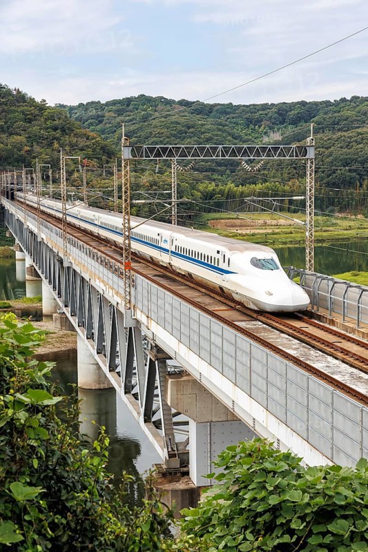 Shinkansen type N700 high-speed train of Japan Rail JR train on the Sanyo Shinkansen line in Kurashiki, Japan, Asia