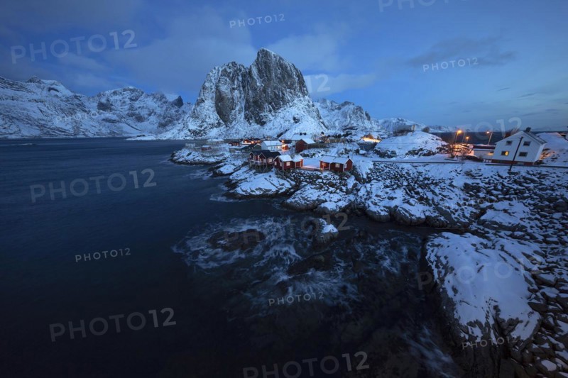 Hamnøya with Mount Festhaeltinden (389m), Lofoten, Norway, dark, sea, surf, houses, snow, winter, Europe