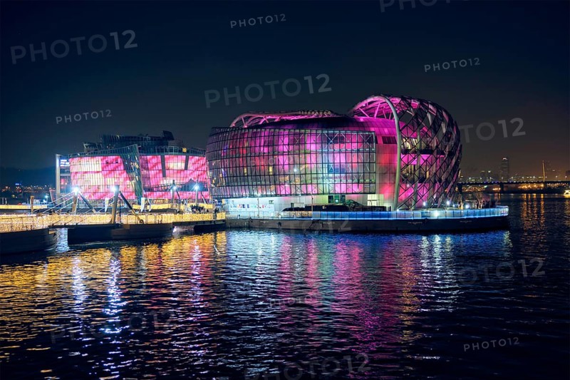SEOUL, SOUTH KOREA, APRIL 7, 2017: Some Sevit culture complex on artificial floating islands located near the Banpo Bridge illuminated at night, Seoul, South Korea, Asia