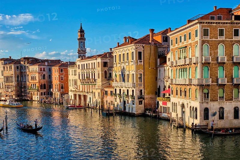 VENICE, ITALY, JUNE 27, 2018: Grand Canal with boats and gondolas on sunset, Venice, Italy, Europe