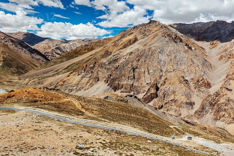 Manali-Leh highway in Himalayas with buses. Ladakh, India, Asia