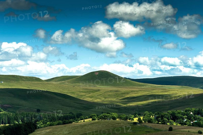 View of the Chamaroux mountain near the village of Montgreleix, Cezallier massif, Auvergne Volcanoes Regional Natural Park, Puy de Dome department, Auvergne Rhone Alpes