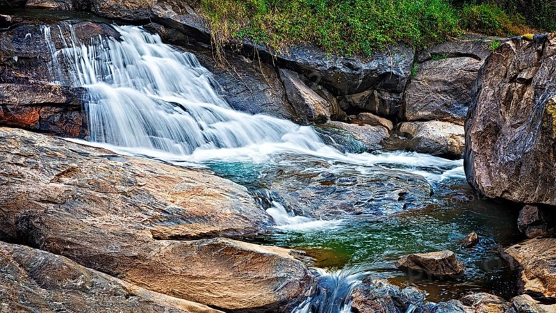 Panorama of waterfall cascade shot with long exposure