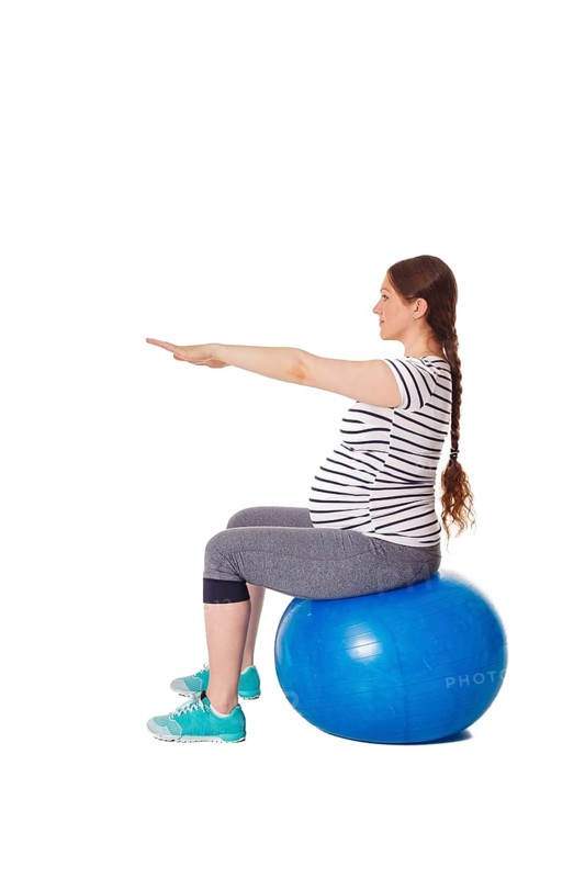 Pregnancy exercise concept, pregnant woman doing exercises with exercise ball isolated on white background