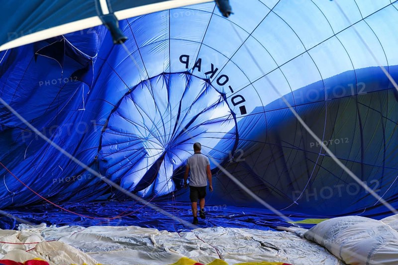 View into the interior of a blue hot air balloon, lying on the ground, preparation for the 26th Warsteiner International Mountain Balloon Festival, Warstein, Sauerland, North Rhine-Westphalia, Germany, Europe