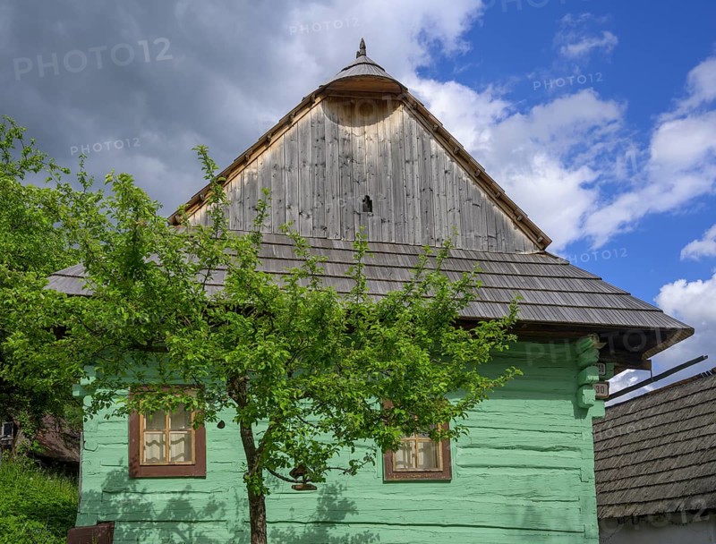 Colourfully painted wooden house in the village of Vlkolinec, Unesco World Heritage Site, Ružomberok, Žilinský kraj, Slovakia, Europe