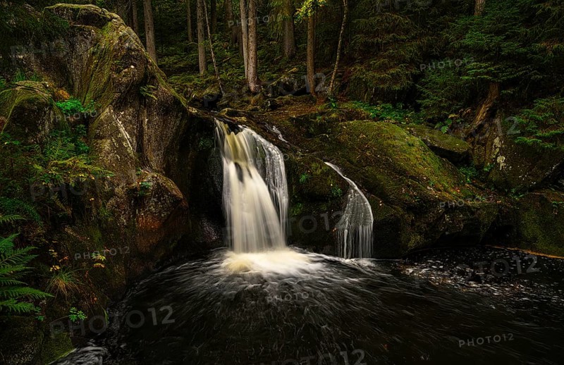 Waterfall of the Krai Woog Gumpen in autumn, Schwarzenbächletal, Görwihl, Black Forest, Baden-Württemberg, Germany Waterfall in the autumn forest with rocks, Krai Woog Gumpen, Göhrwil, Black Forest, Baden-Württemberg, Germany, Europe
