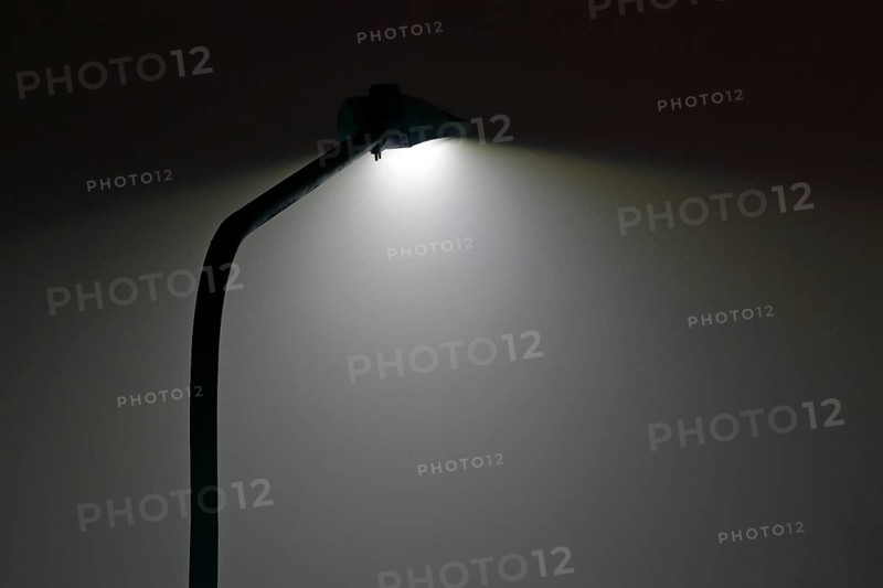 LED street lamp lights up at night