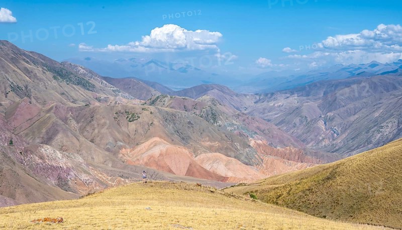 View over eroded mountainous landscape with brown hills, mountains and steppe, Chuy province, Kyrgyzstan, Asia