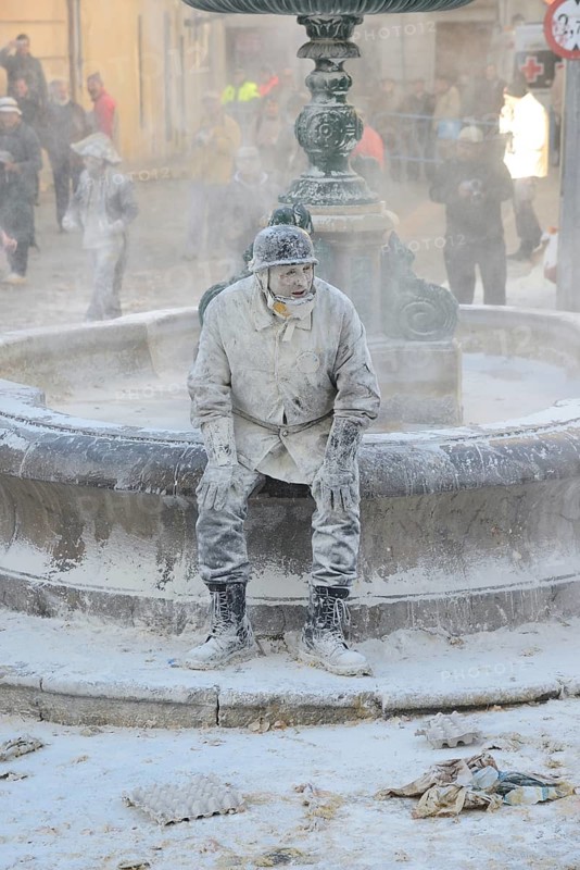 Els Enfarinats flour fight, rebels, armed with flour, eggs and firecrackers, take over the regiment of the city for one day, Plaza de la Iglesia, Ibi, Province of Alicante, Costa Blanca, Spain, Europe