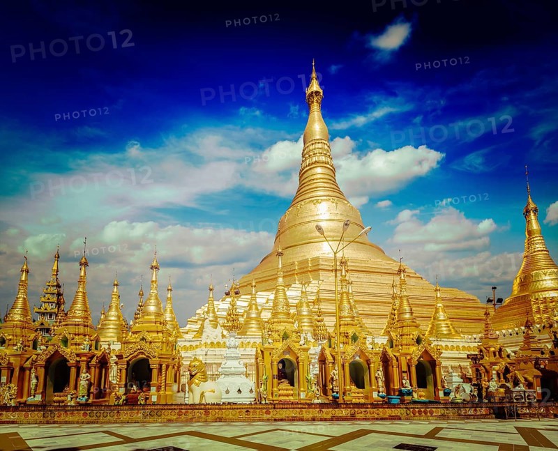 Vintage retro effect filtered hipster style image of Myanmer famous sacred place and tourist attraction landmark, Shwedagon Paya pagoda. Yangon, Myanmar, Asia