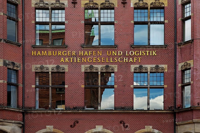 Hamburger Hafen und Logistik Aktiengesellschaft, abbreviated HHLA, lettering on a facade, Speicherstadt, Hamburg, Germany, Europe
