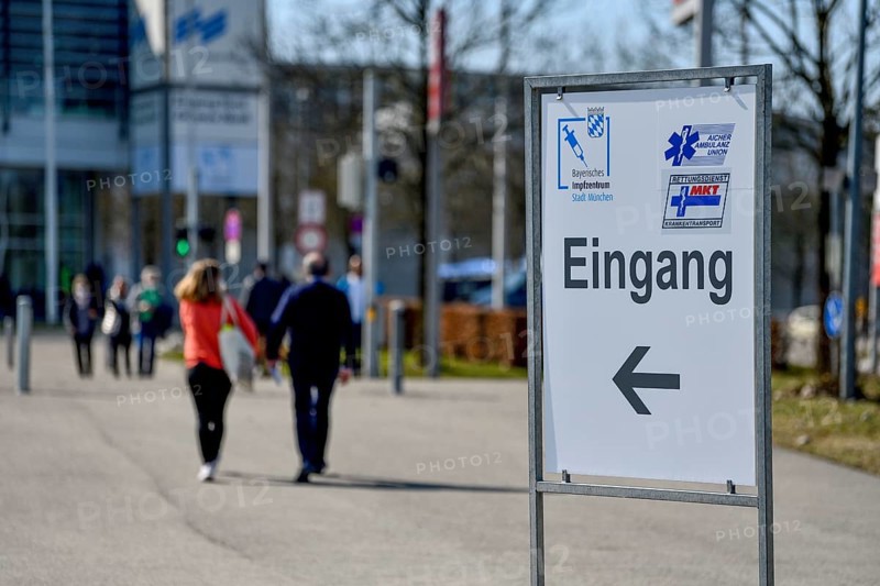 People go to the Bavarian Vaccination Center of the City of Munich, Corona virus, Sars-CoV-2, Paul-Henri-Spaak-Straße, Munich-Riem, Bavaria, Germany, Europe