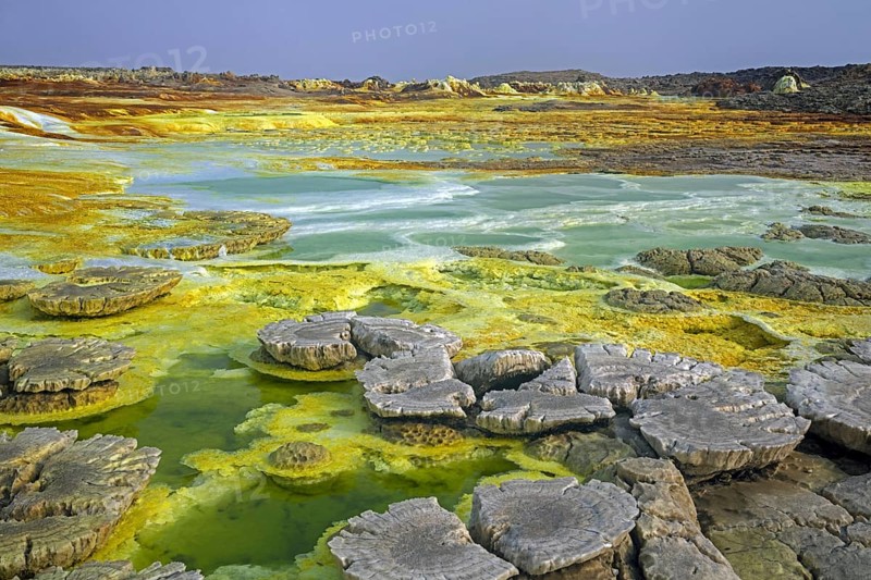 Dallol sulfur springs, hot springs in the Danakil Depression discharge brine and acidic liquid in green acid ponds, Afar Region, Ethiopia, Africa